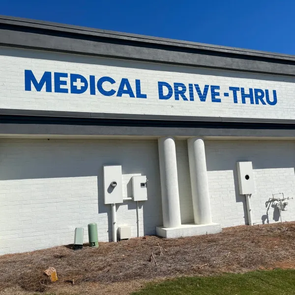 Roswell Building Sign Brick Wrap Graphics