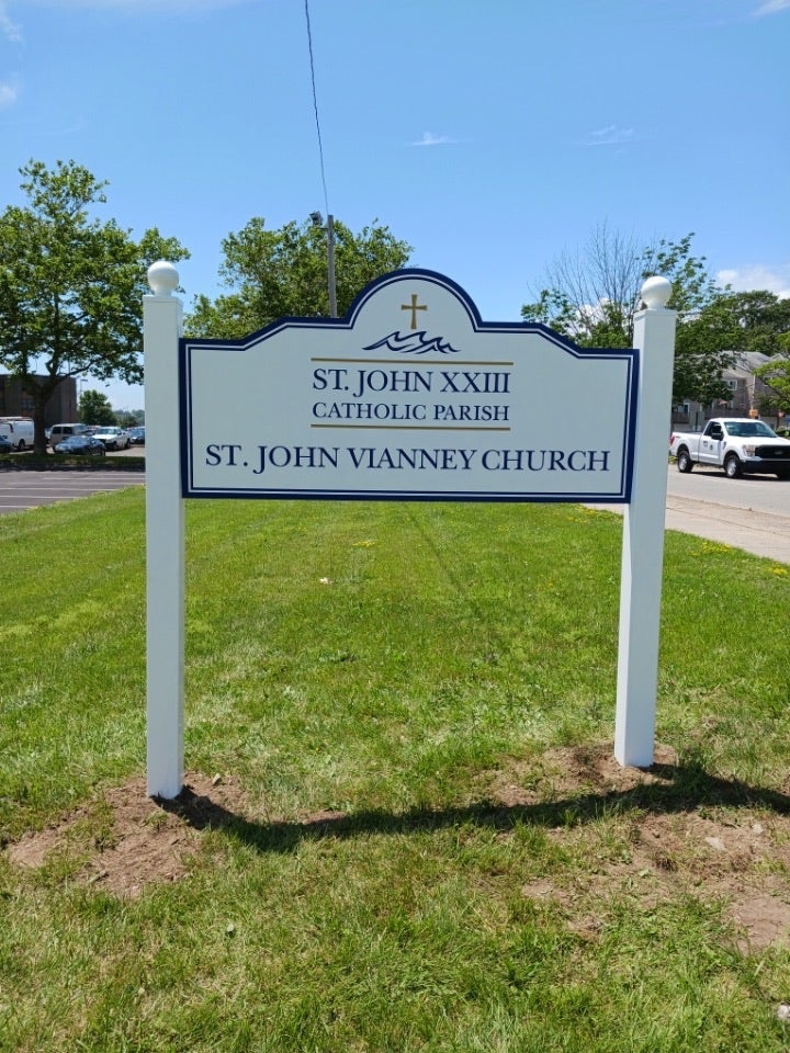 St. John Vianney New Carved Signs