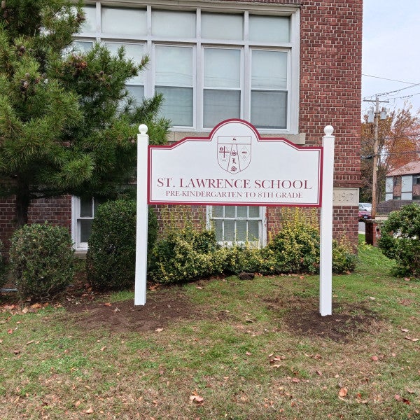 St. John Vianney New Carved Signs