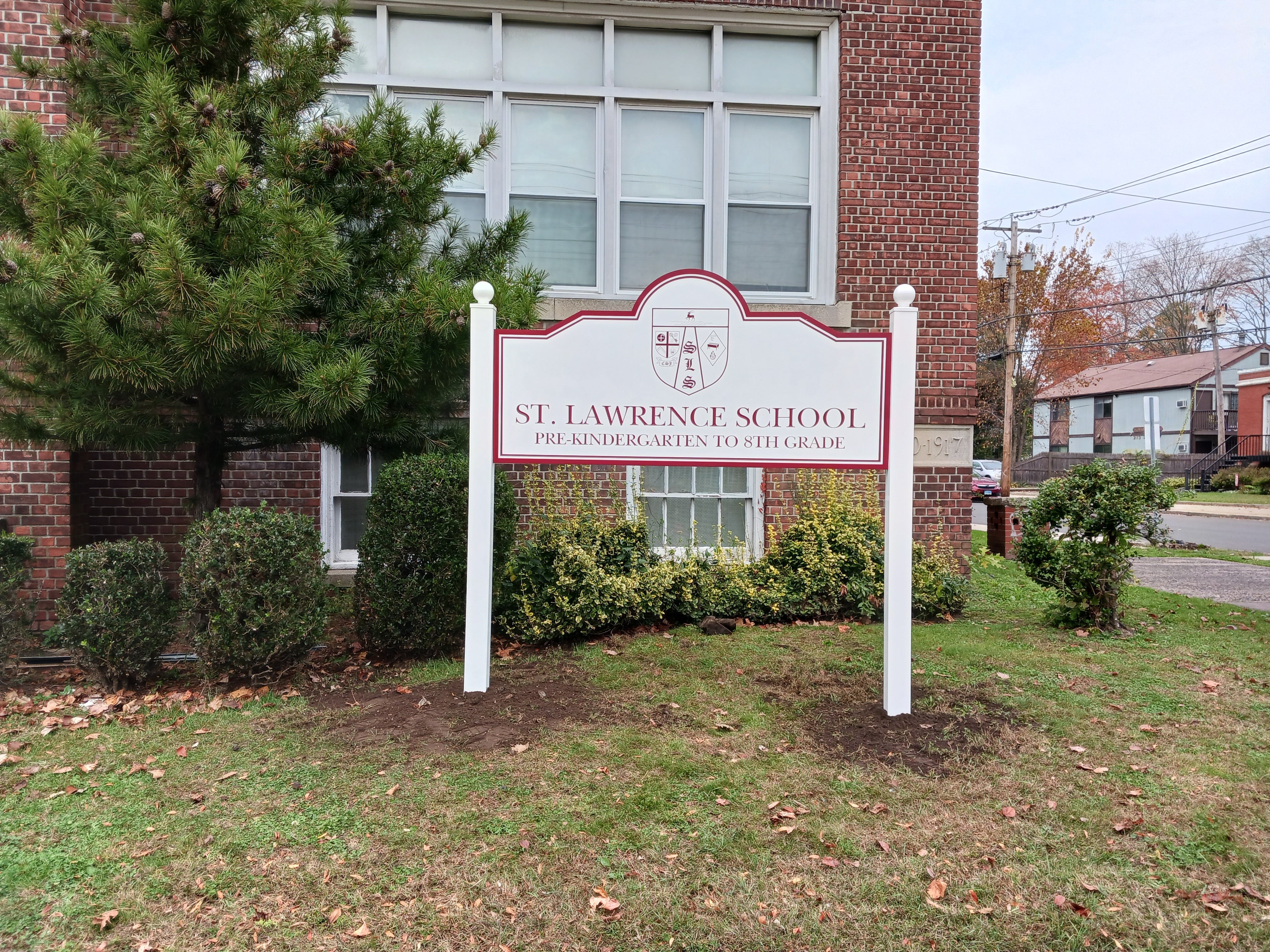 St. John Vianney New Carved Signs