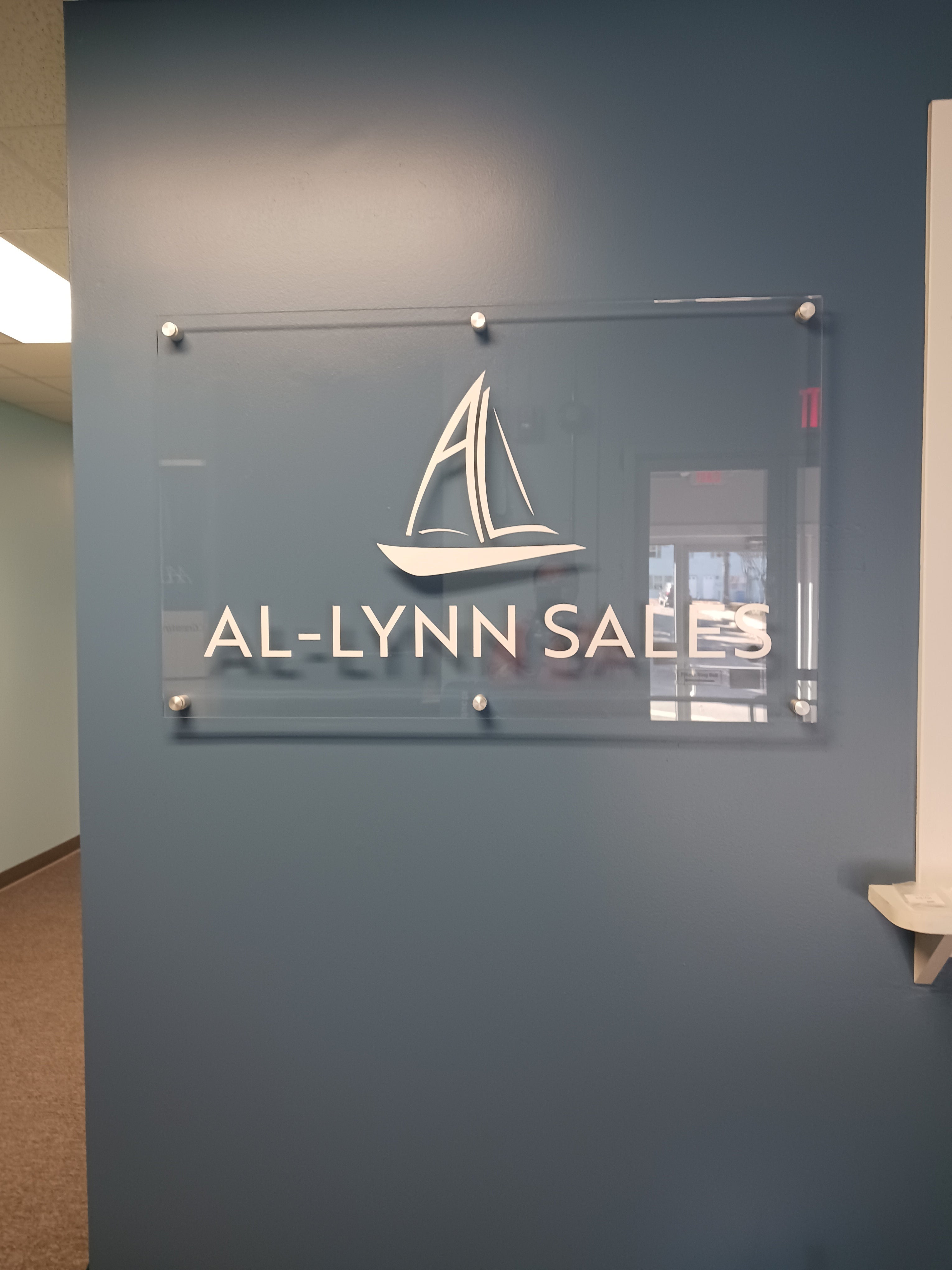 Al Lynn Sales - Projecting Sign & Interior Lobby