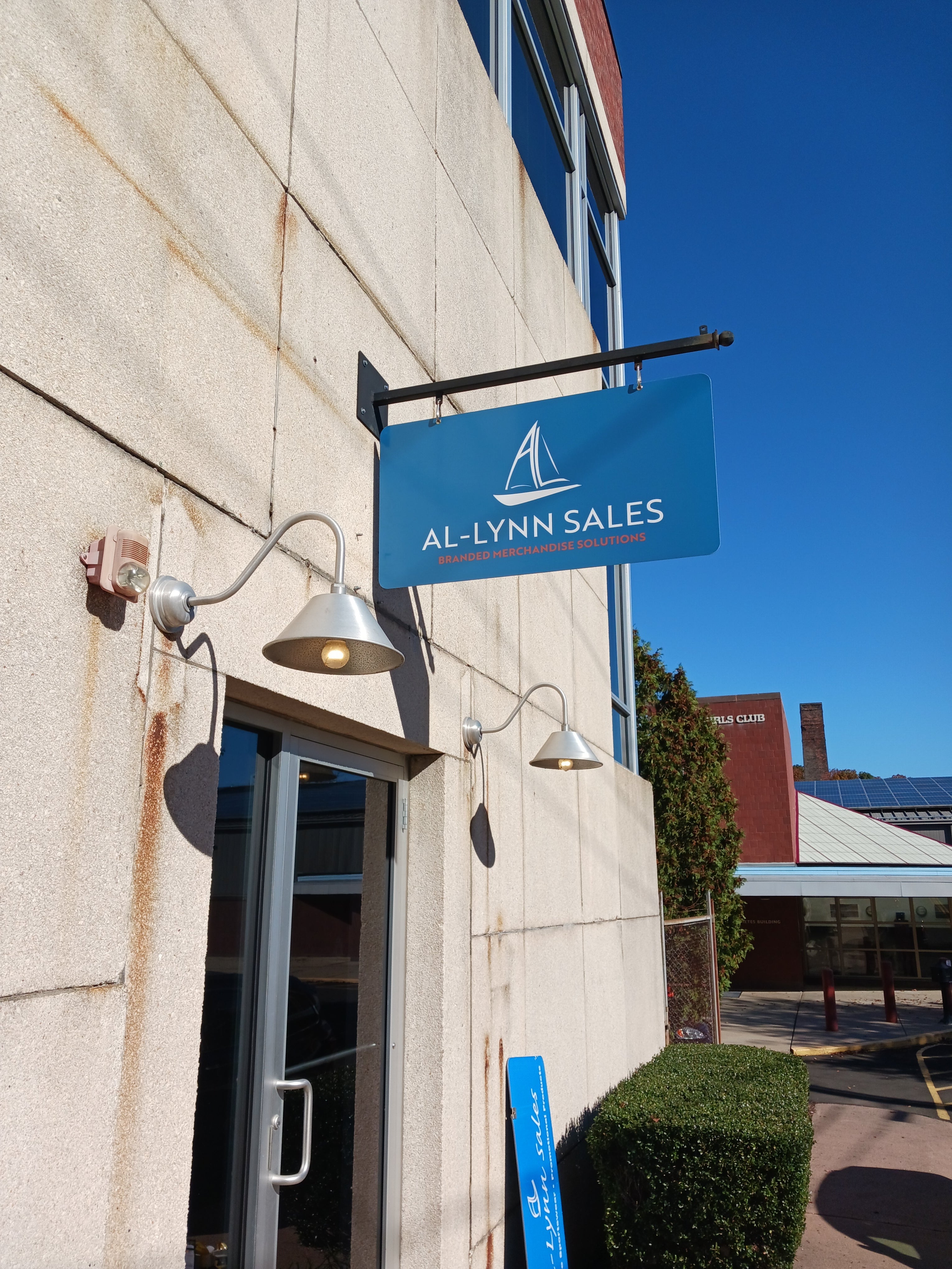 Al Lynn Sales - Projecting Sign & Interior Lobby