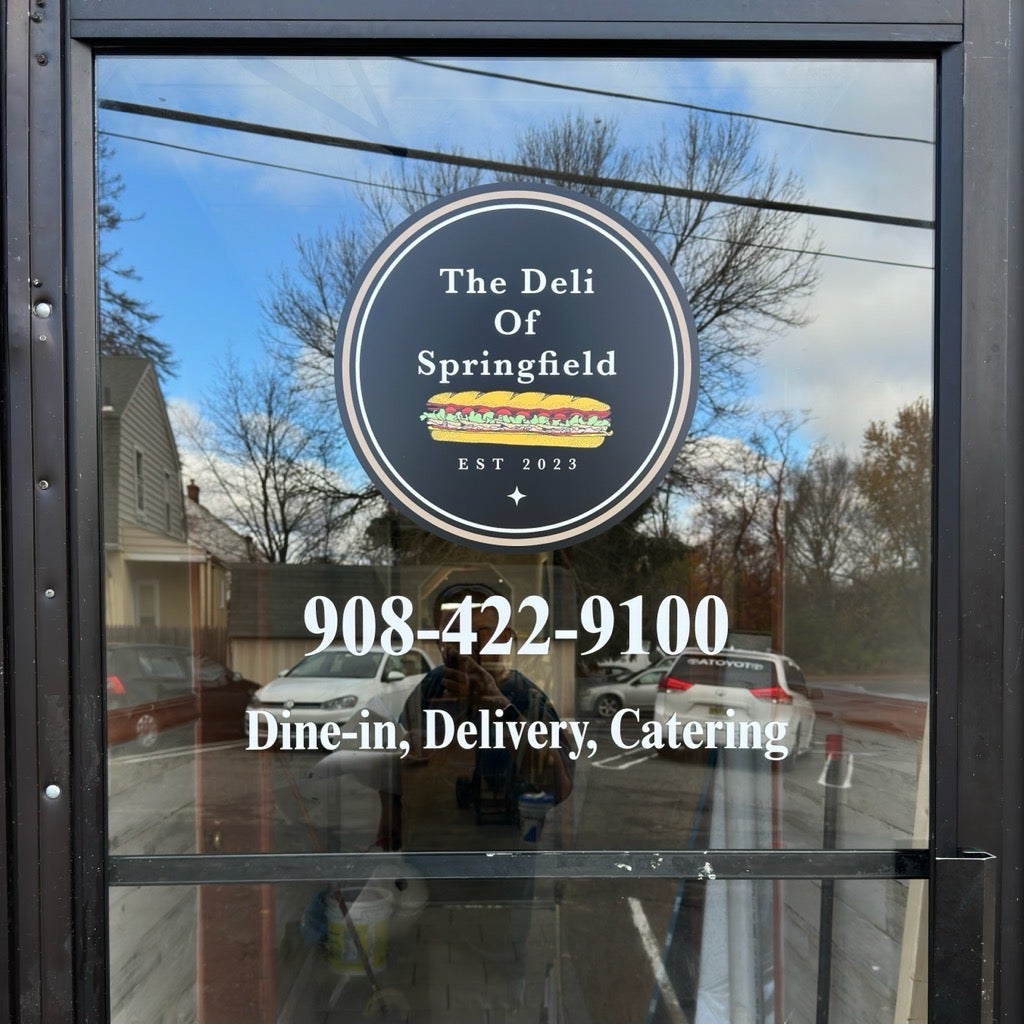 New Deli New Sign
