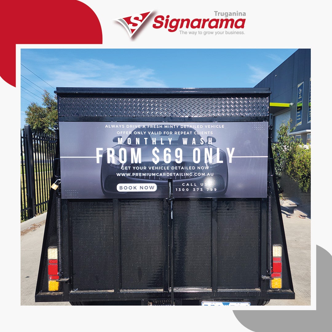 Car detailing Guru- Capture attention on the road with our trailer wrap sign.