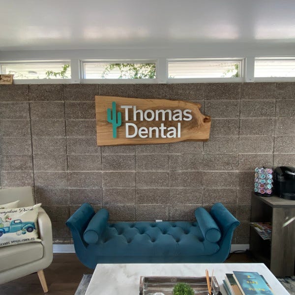 Thomas Dental lobby sign in front entrance, made from wood. 602.954.4682 http://www.ArcadiaSignarama.com