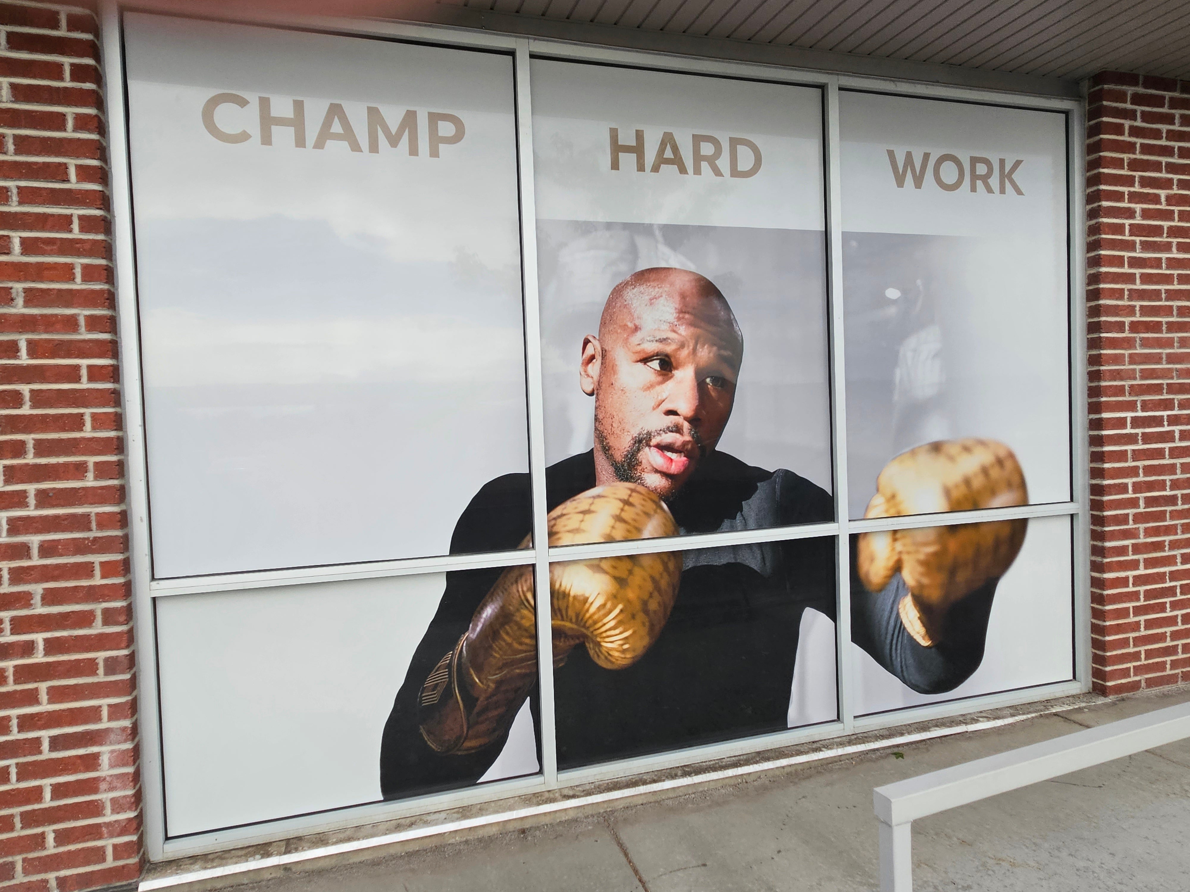 Large Wall Graphic • Store Front Window Perf with printed graphics • Lobby Sign • Reception Desk with Logo in Orem for Mayweather Boxing