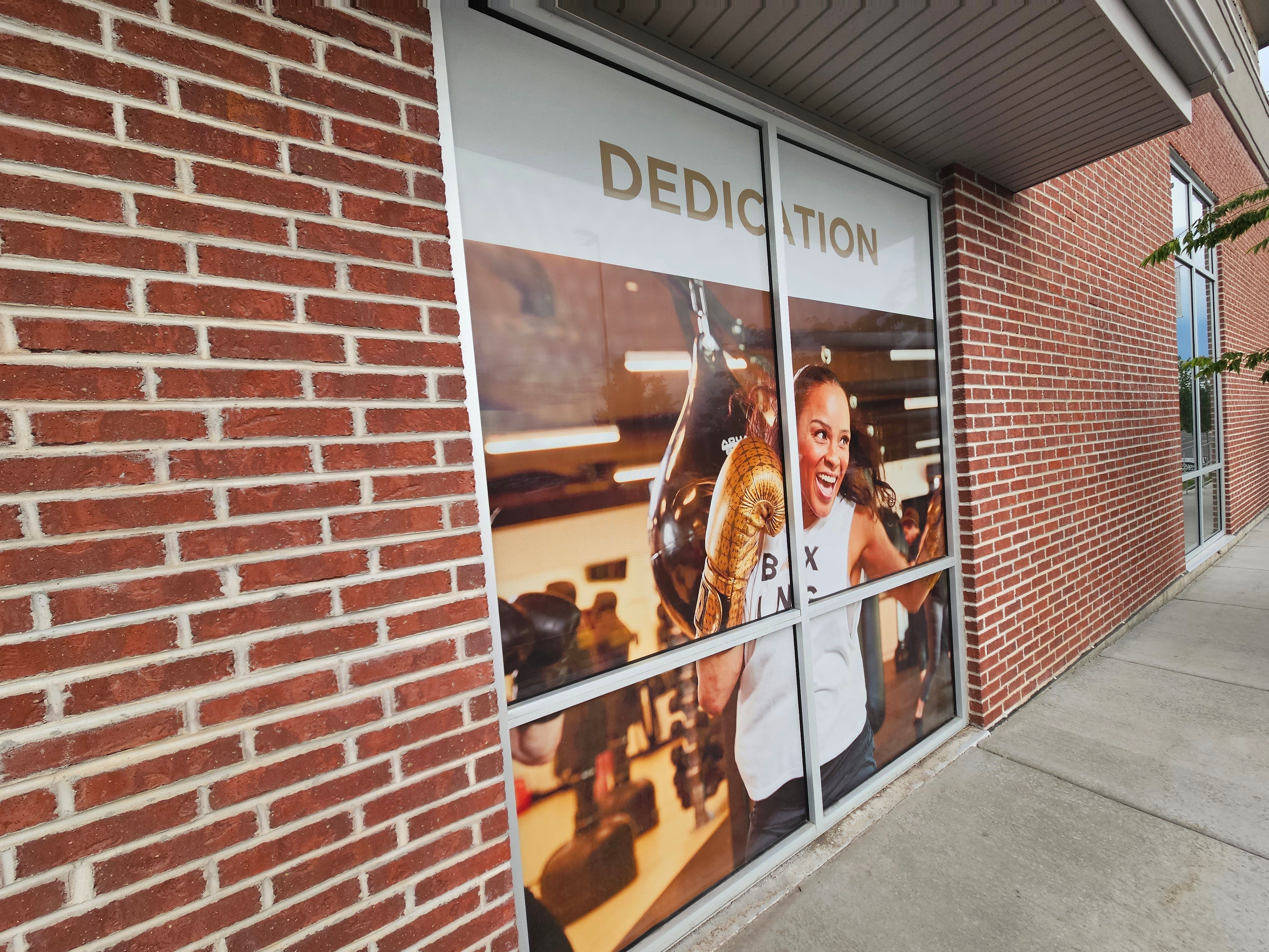 Large Wall Graphic • Store Front Window Perf with printed graphics • Lobby Sign • Reception Desk with Logo in Orem for Mayweather Boxing