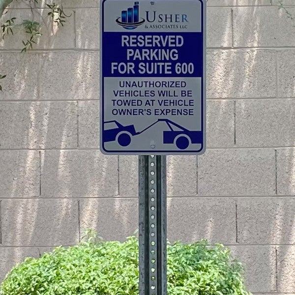 Usher and Associates reserved parking sign created and installed by Arcadia Signarama call us at 602.954.4680 or online at http://www.ArcadiaSignarama.com