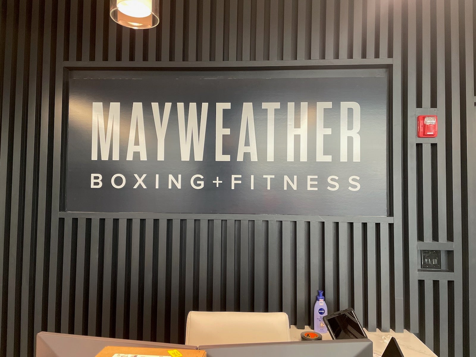 Large Wall Graphic • Store Front Window Perf with printed graphics • Lobby Sign • Reception Desk with Logo in Orem for Mayweather Boxing