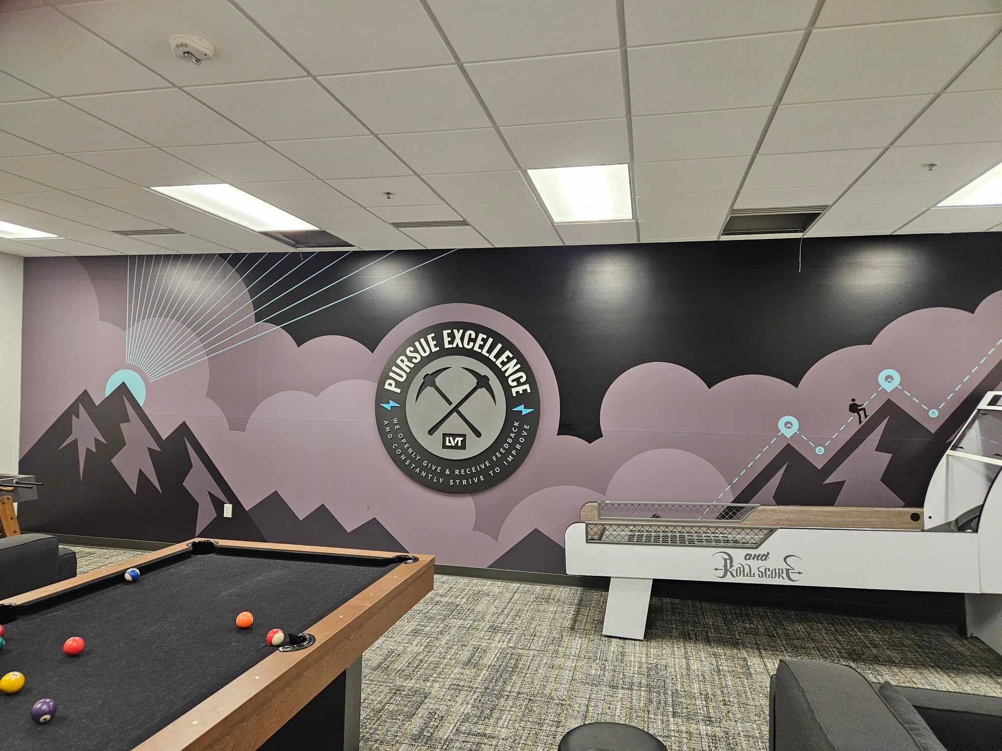 Interior Halo Illuminated Channel Letters • Dimensional Logo Medallion • Large Wall Murals in American Fork for LVT (a Security Systems Company).