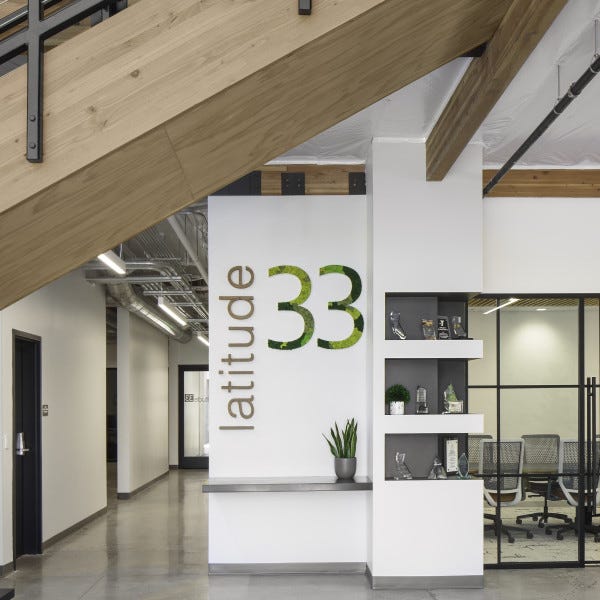 Lattitude lobby sign