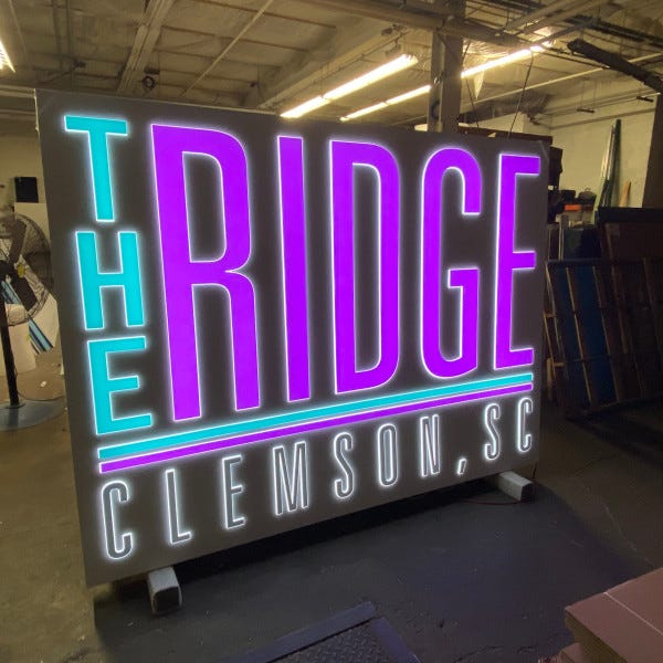 THE RIDGE_PUSH THROUGH SIGN
