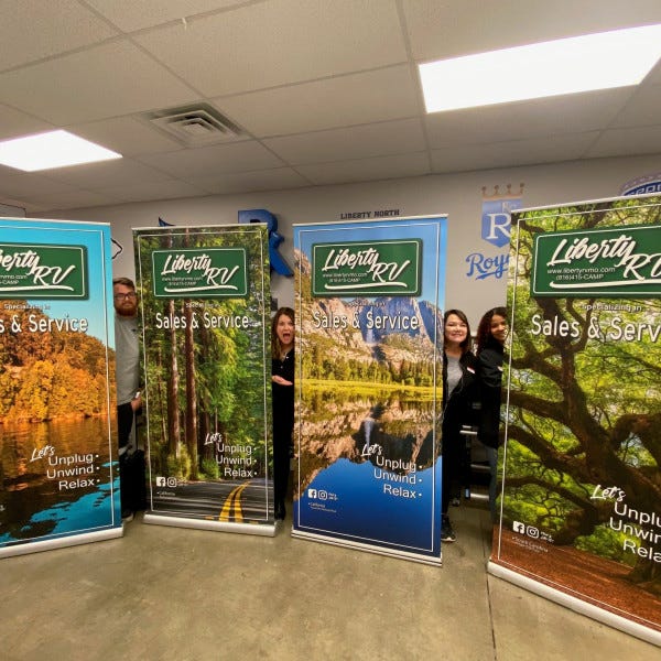 Liberty RV banner stands w Team Signarama Liberty
