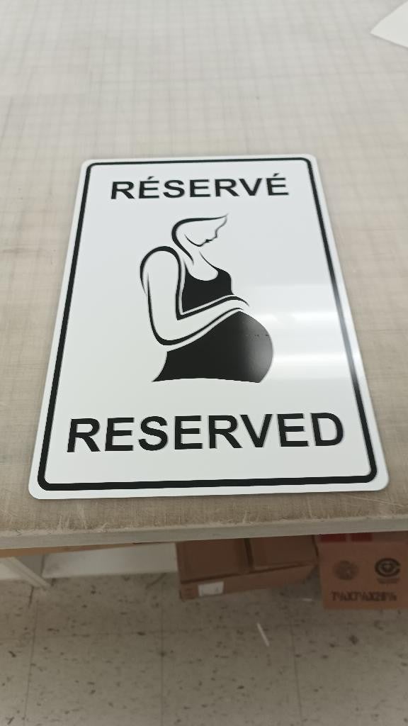 Interesting reserved parking sign