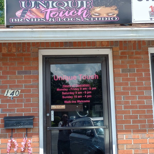 Building Sign for Unique Touch Beauty Salon