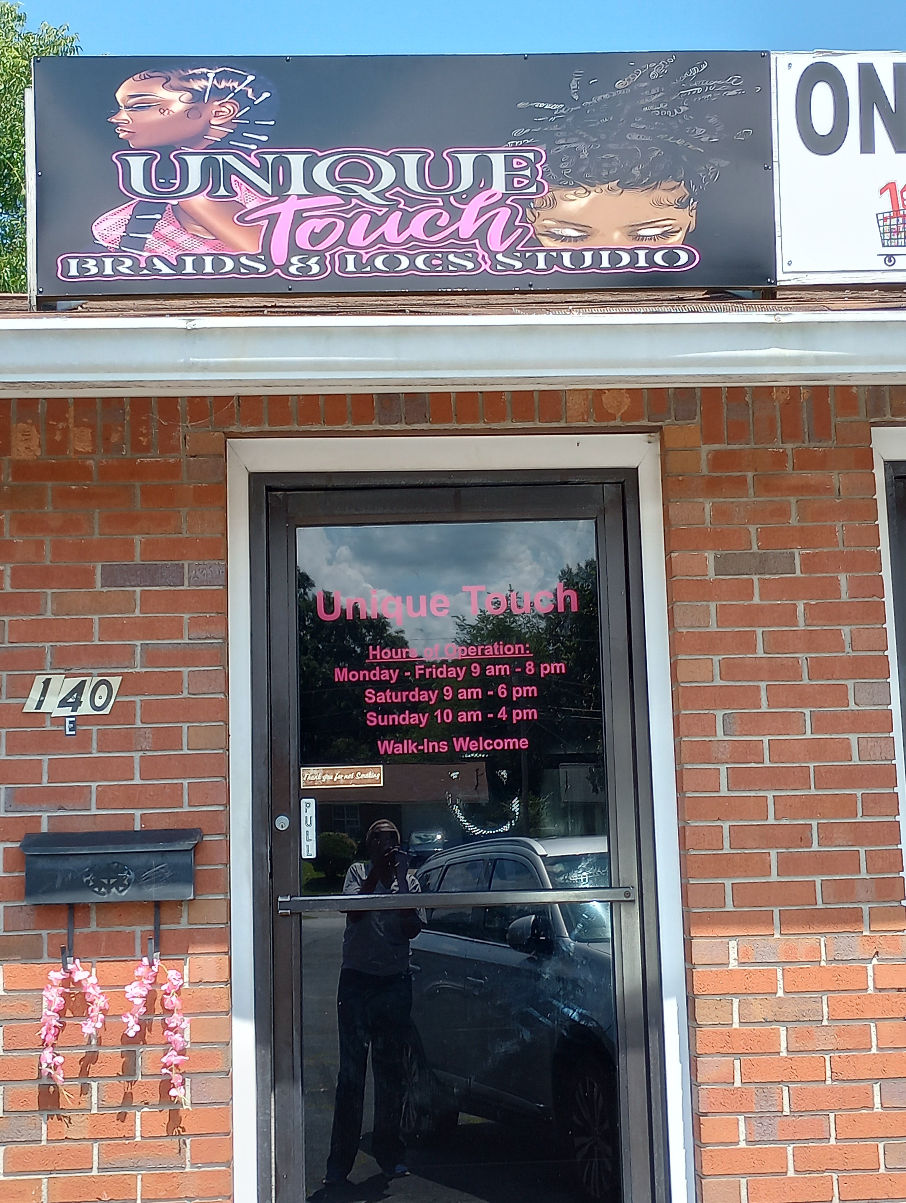 Building Sign for Unique Touch Beauty Salon