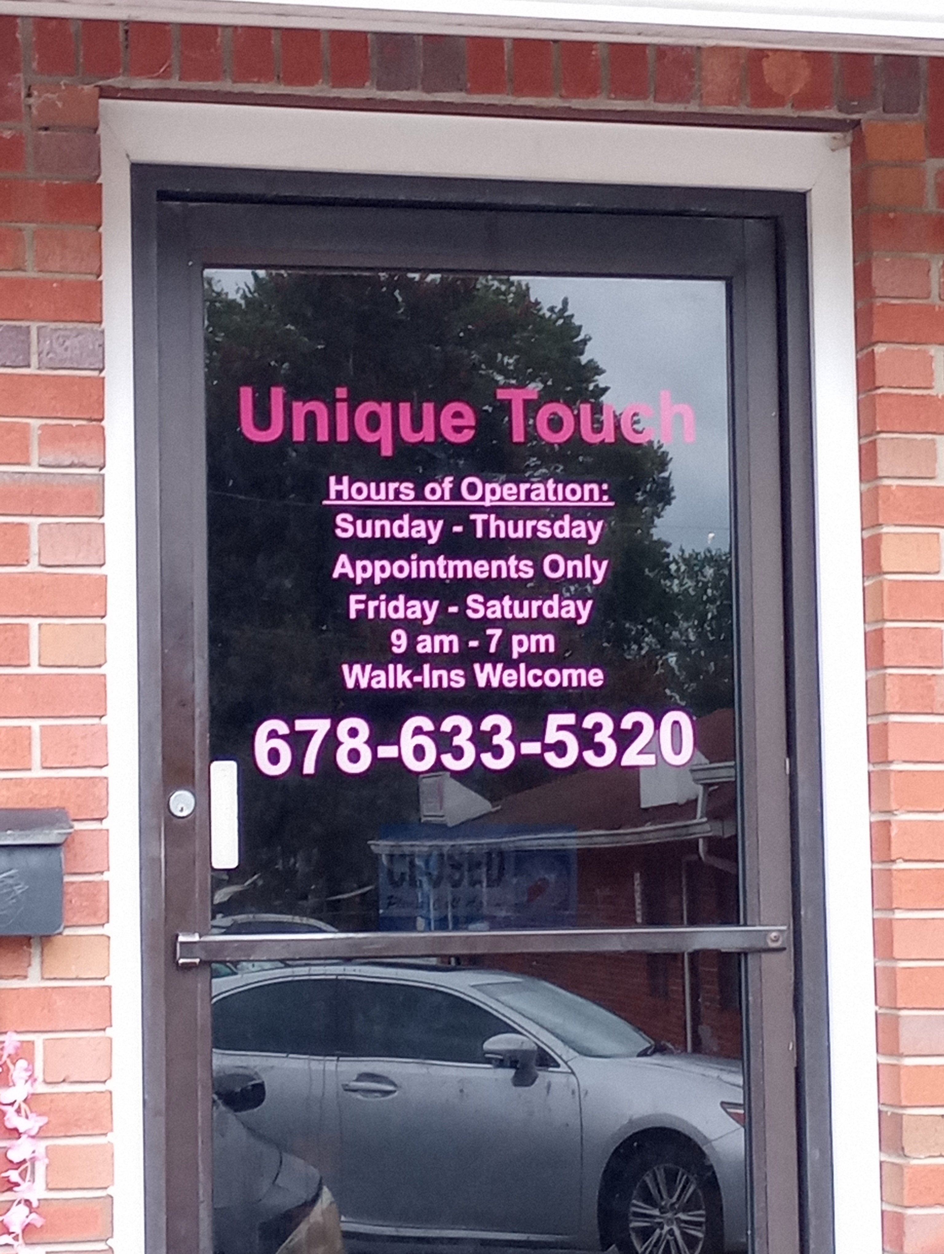 Door Graphics for "Unique Touch" Beauty Salon