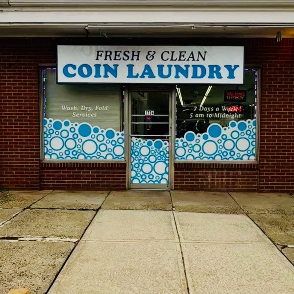 Updating Signs at the Local Laundromat