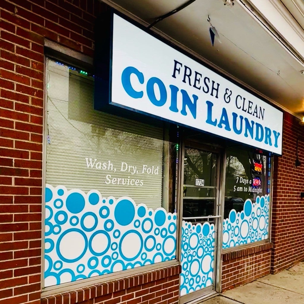 Updating Signs at the Local Laundromat