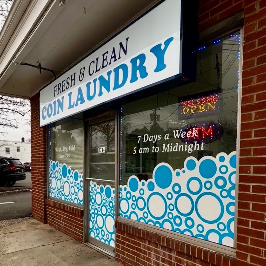 Updating Signs at the Local Laundromat