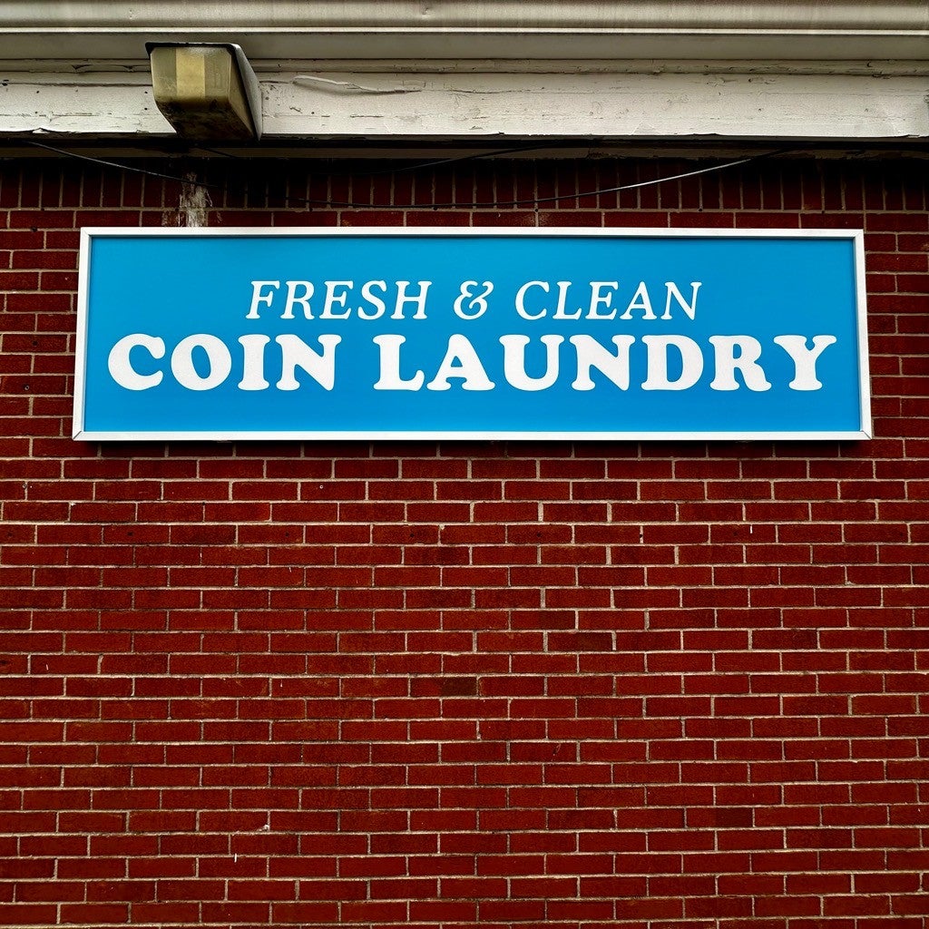 Updating Signs at the Local Laundromat