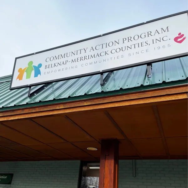 Community Action tube frame sign
