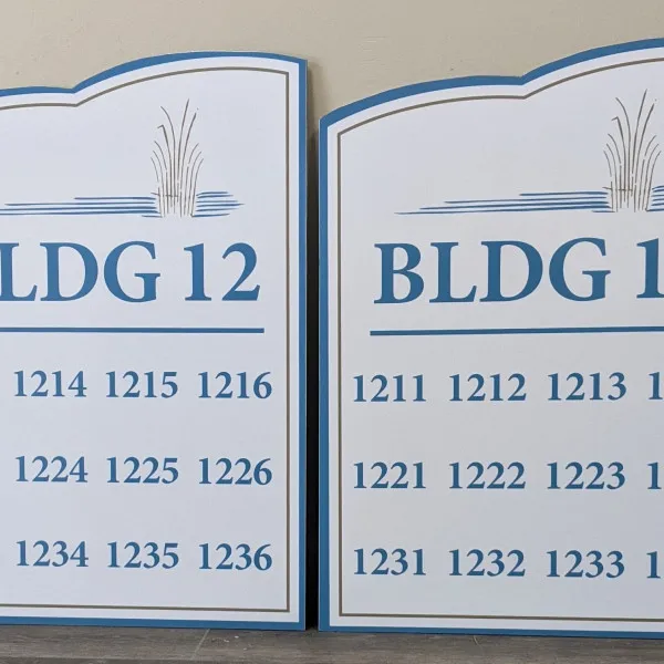 The Woods Building Sign