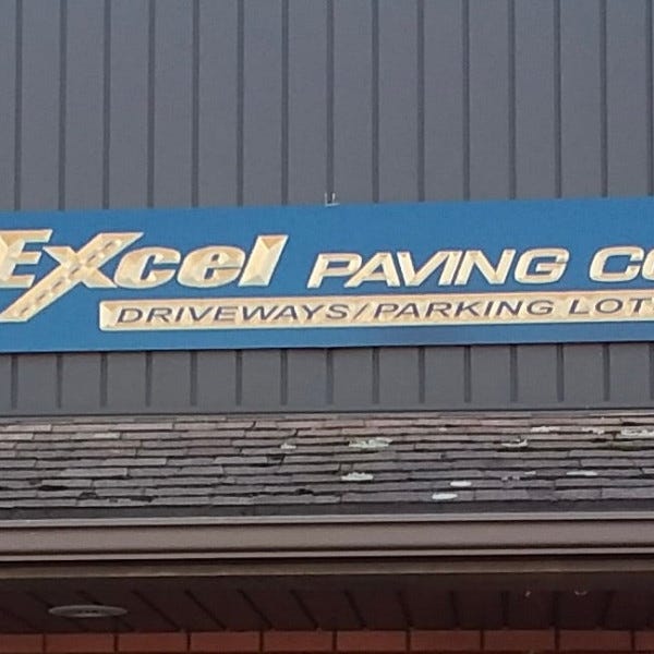 Carved Sign - Excel Paving