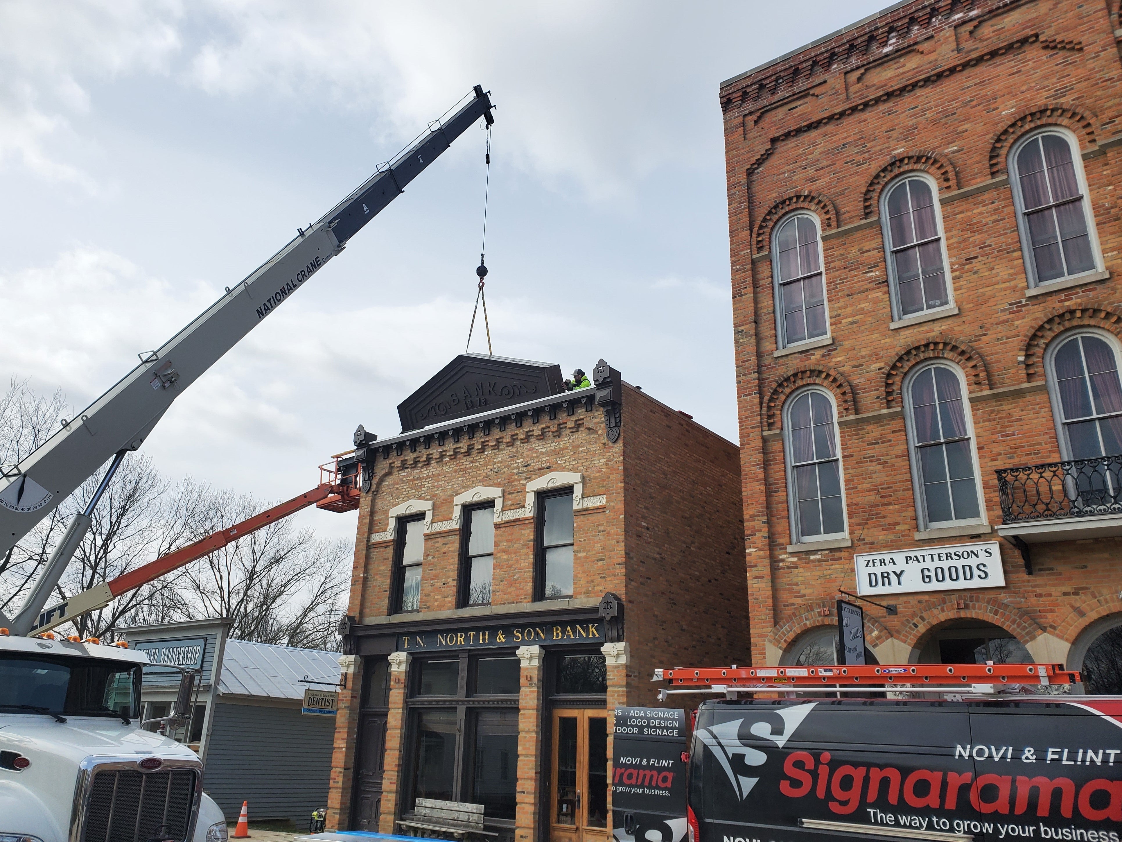 Crossroads Village Historical Bank: Installation of Restored Sign