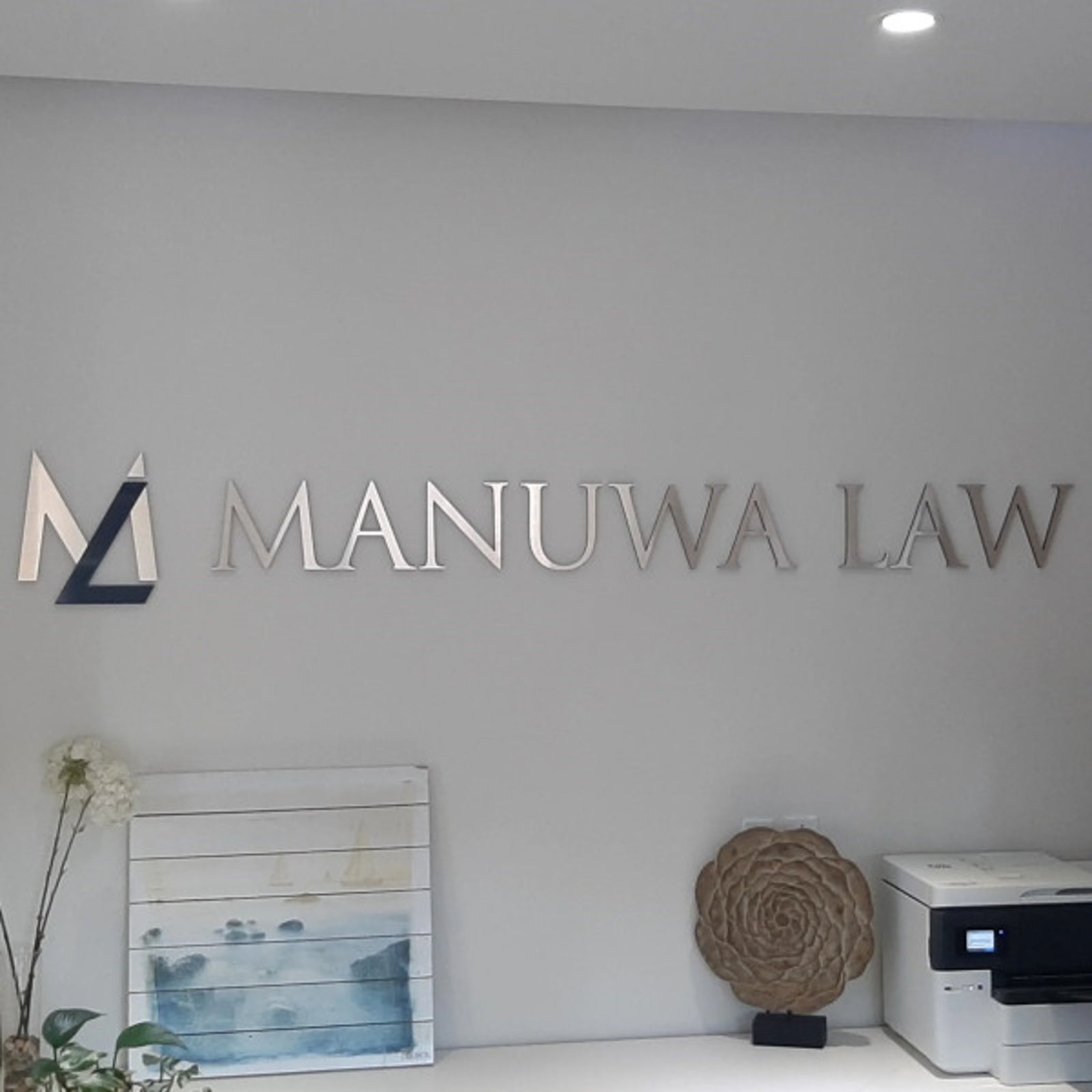 Manuwa Law Reception Sign in Edmonton, AB