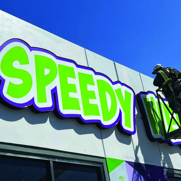 Speedy Weedy Building Sign