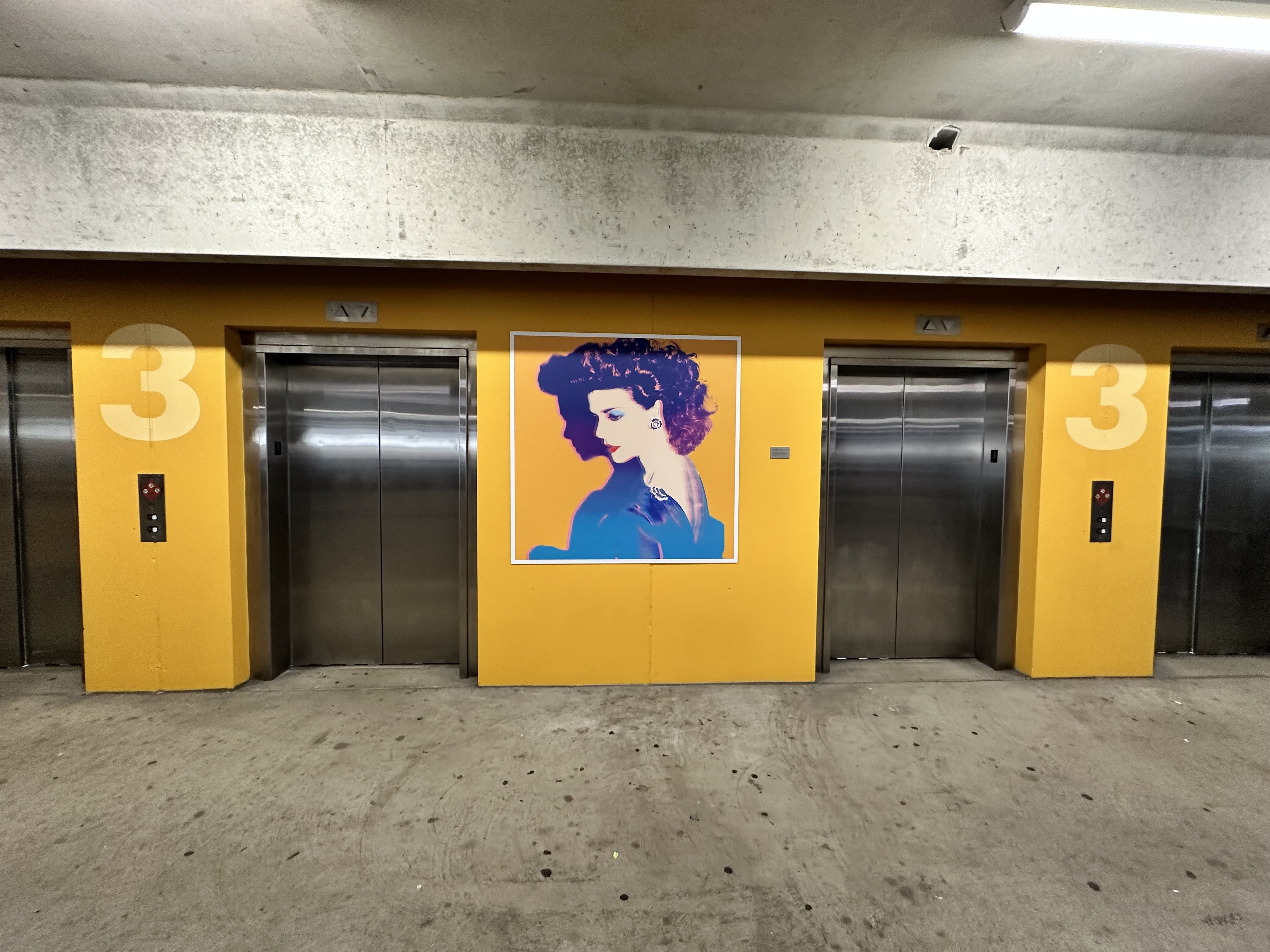 Color for the win! Andy Warhol Garage gets a face lift with a mix of ACM and vinyl graphics. North Side, Pittsburgh, PA