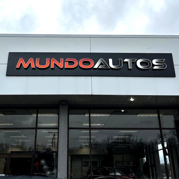 Mundo Autos LED Lit Chanel Letters on Backer Board