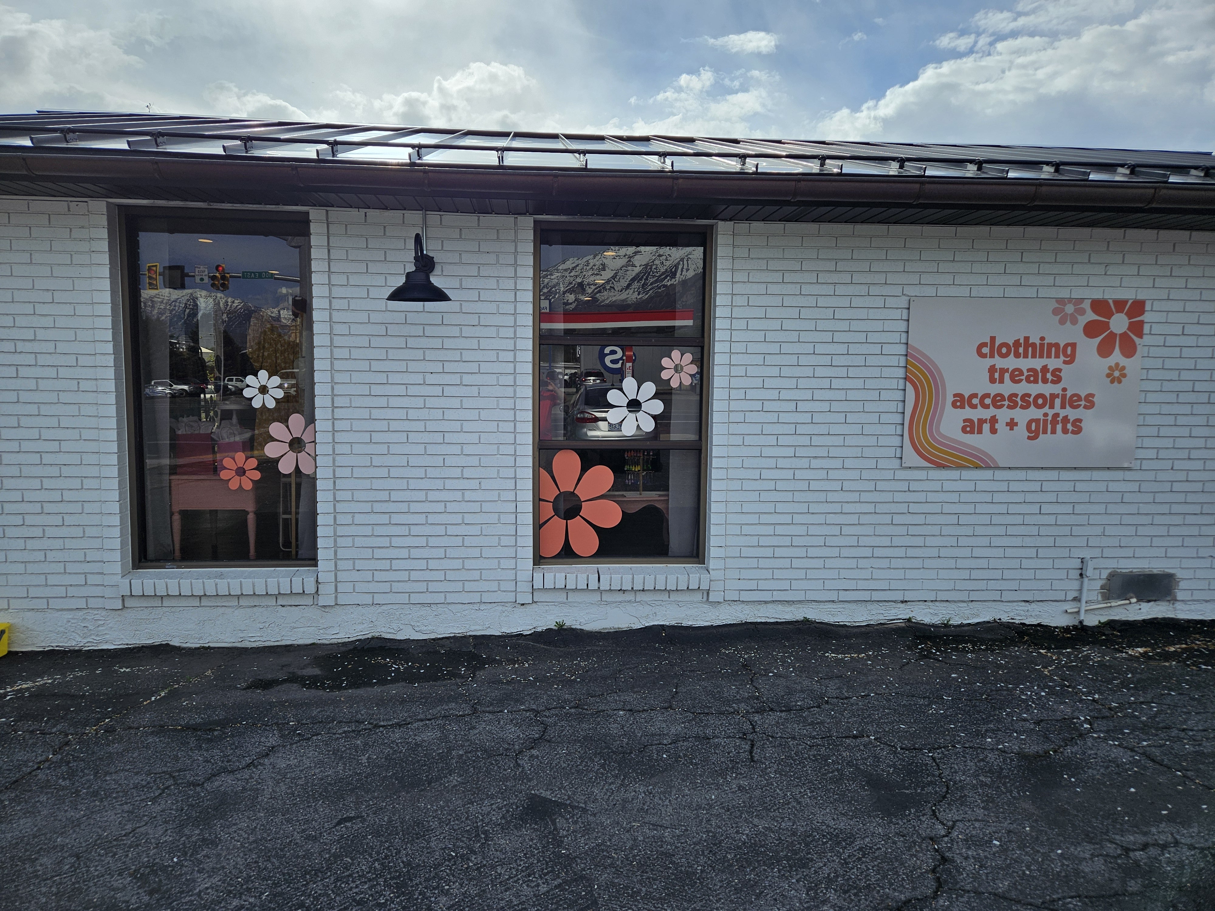 Window Vinyl and ACM Advertising Building Sign