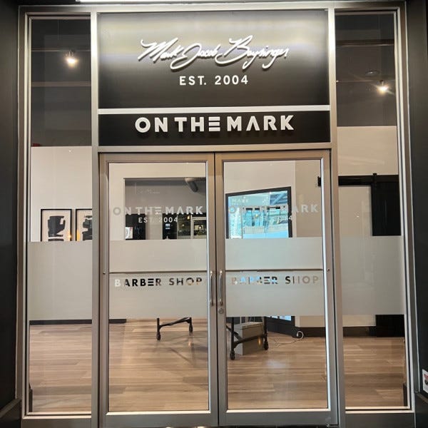 On the Mark Branded Calling Card Storefront - Bellevue, WA