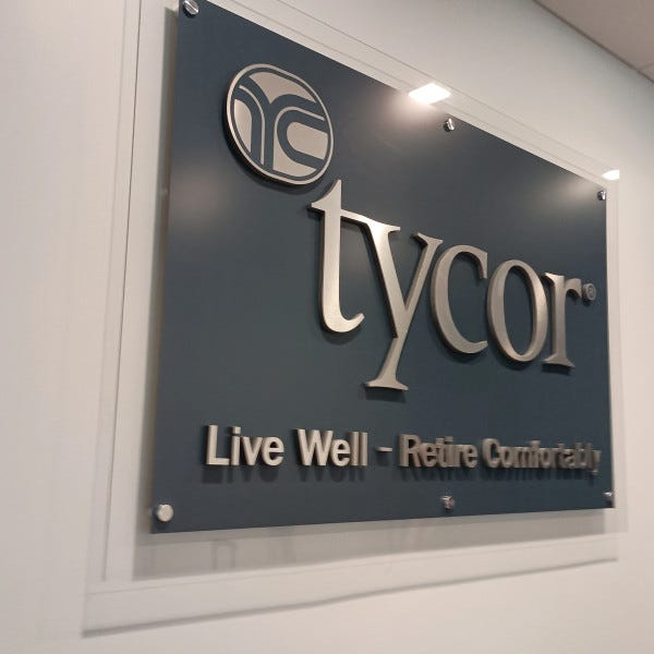 Acrylic wall sign with standoffs