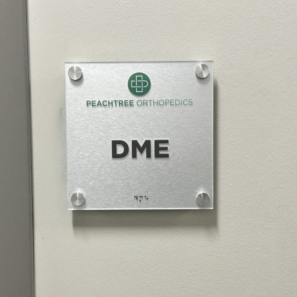 CIG Consulting ADA Sign