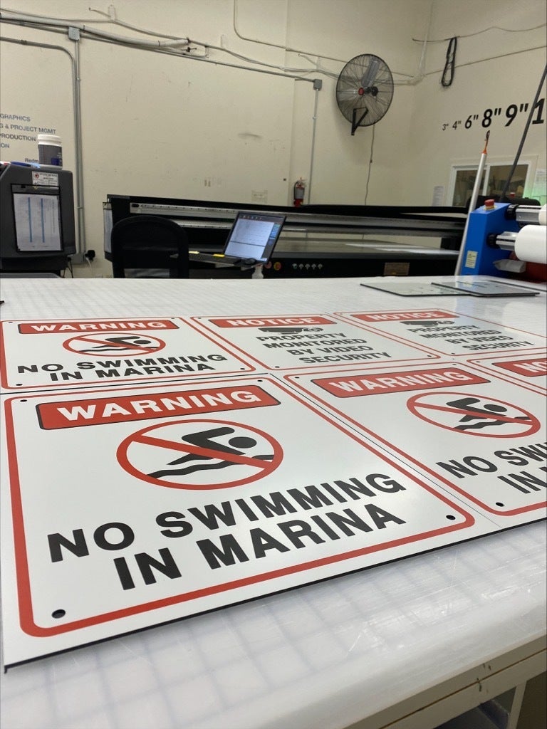 Signs Keep People - Marinas are updating Signage for the Summer - Redmond, WA