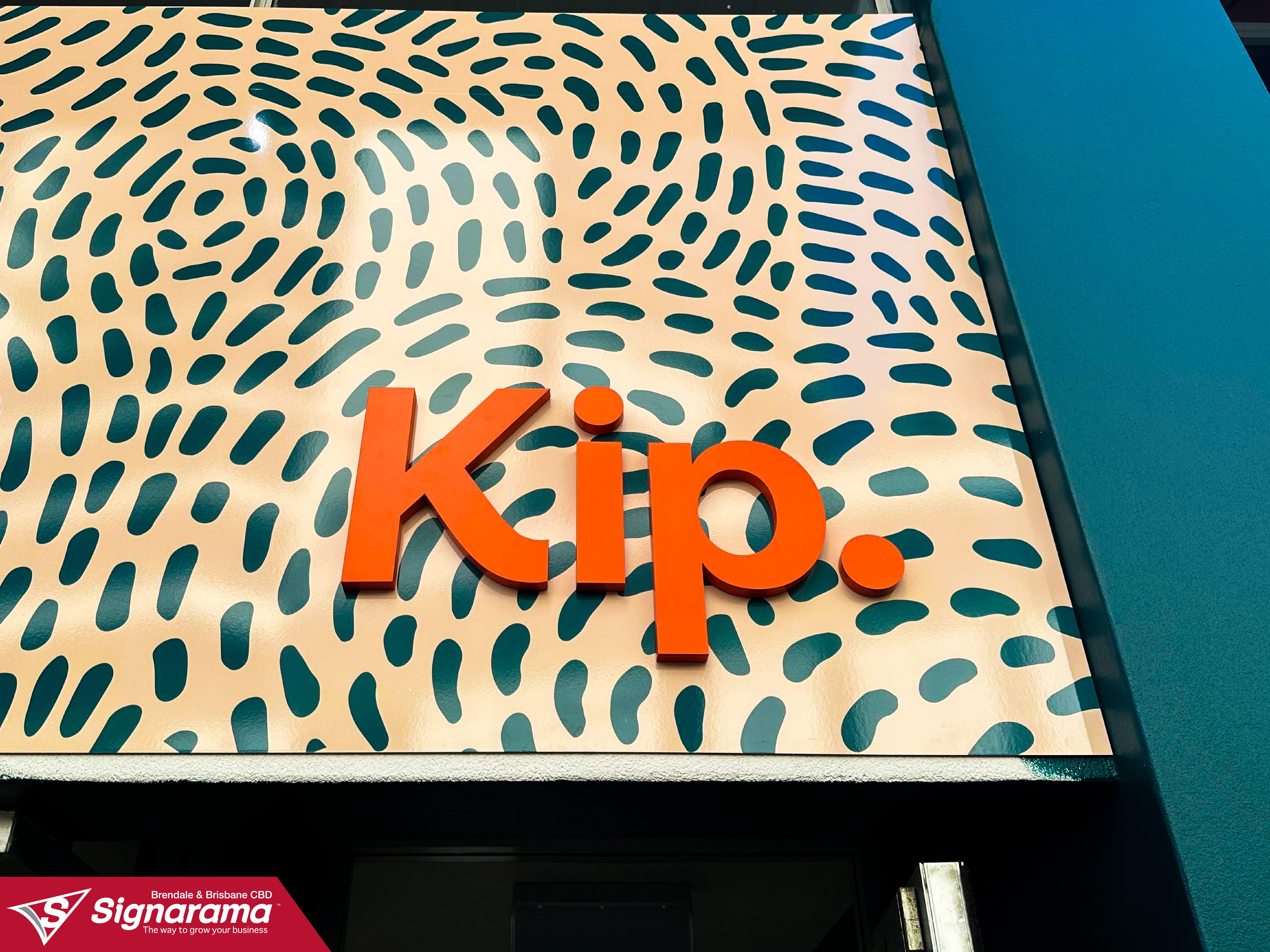 Exciting shop signage for Kip Doggy Daycare in Newstead