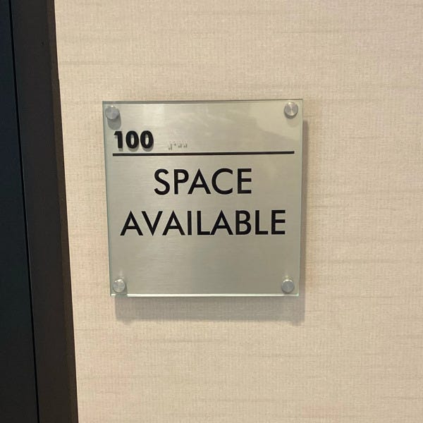 Brushed silver metal and acrylic ADA braille suite marker for way finding and directional signage in schools office building churches installed with standoffs