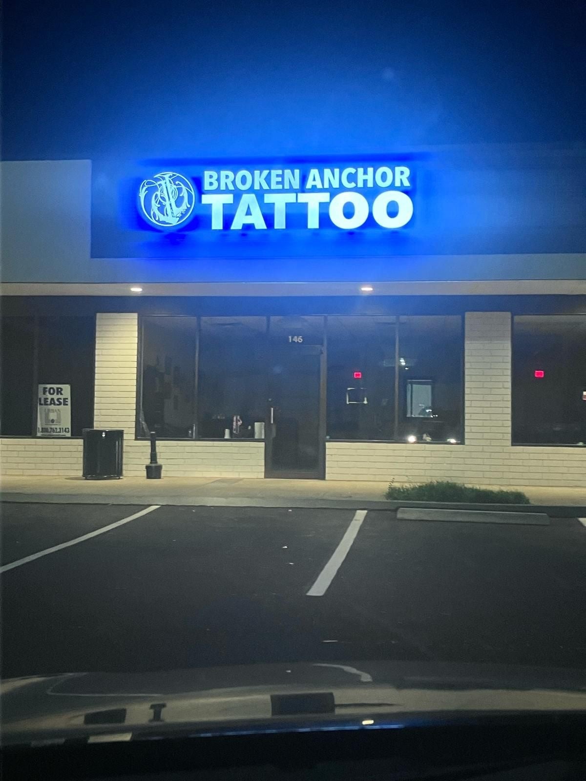 Light Box Logo and Front Lit Channel Letters With Broken Anchor Tattoo