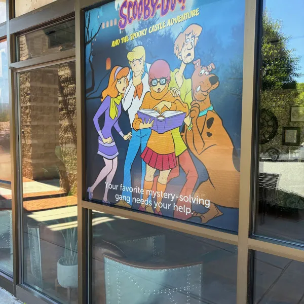 Escapology- Window Perf Film
