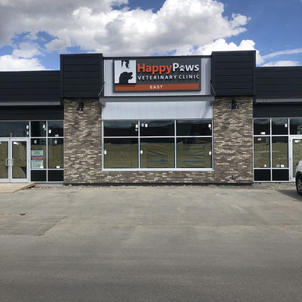 Happy Paws Vet Clinic Outdoor Sign