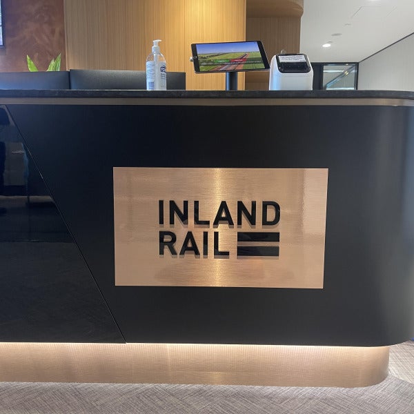 Copper vinyl acrylic sign with 3D black acrylic letters for Inland Rail by Signarama Brendale.