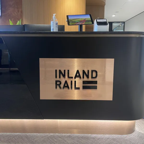 Copper vinyl acrylic sign with 3D black acrylic letters for Inland Rail by Signarama Brendale.