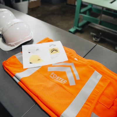 https://cdn.gorilladash.com/images/media/13007505/fully-promoted-usa-ca-0724-corporate-safetywear-hardgoodsimprint-staged-9667-square-667aeabbe2105.jpg?auto=webp&crop=1%3A1%2Csmart&width=400