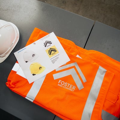 https://cdn.gorilladash.com/images/media/13007515/fully-promoted-usa-ca-0724-corporate-safetywear-hardgoodsimprint-staged-9670-square-667aeabc8c66e.jpg?auto=webp&crop=1%3A1%2Csmart&width=400