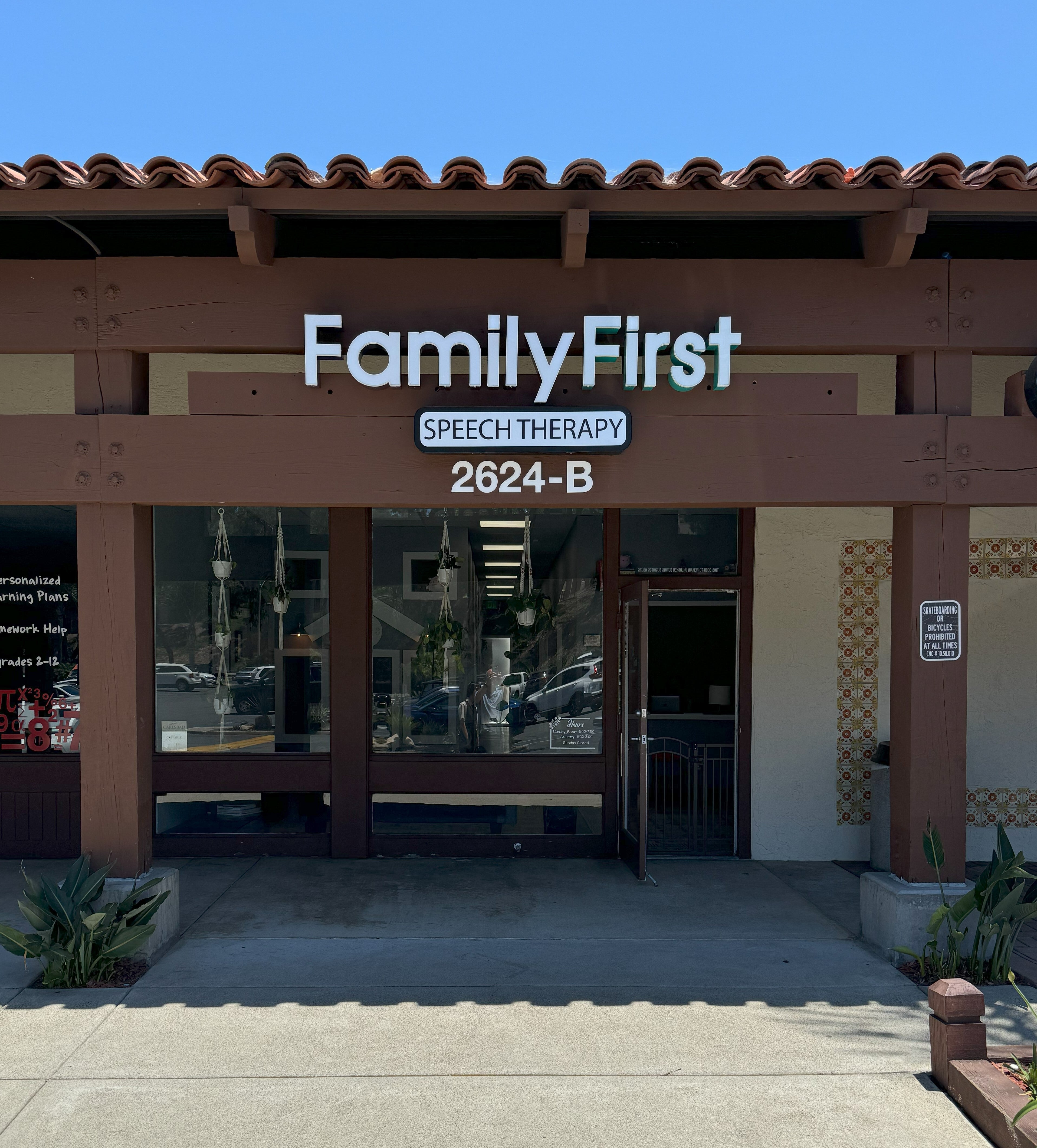Lit mall storefront signage in Carlsbad