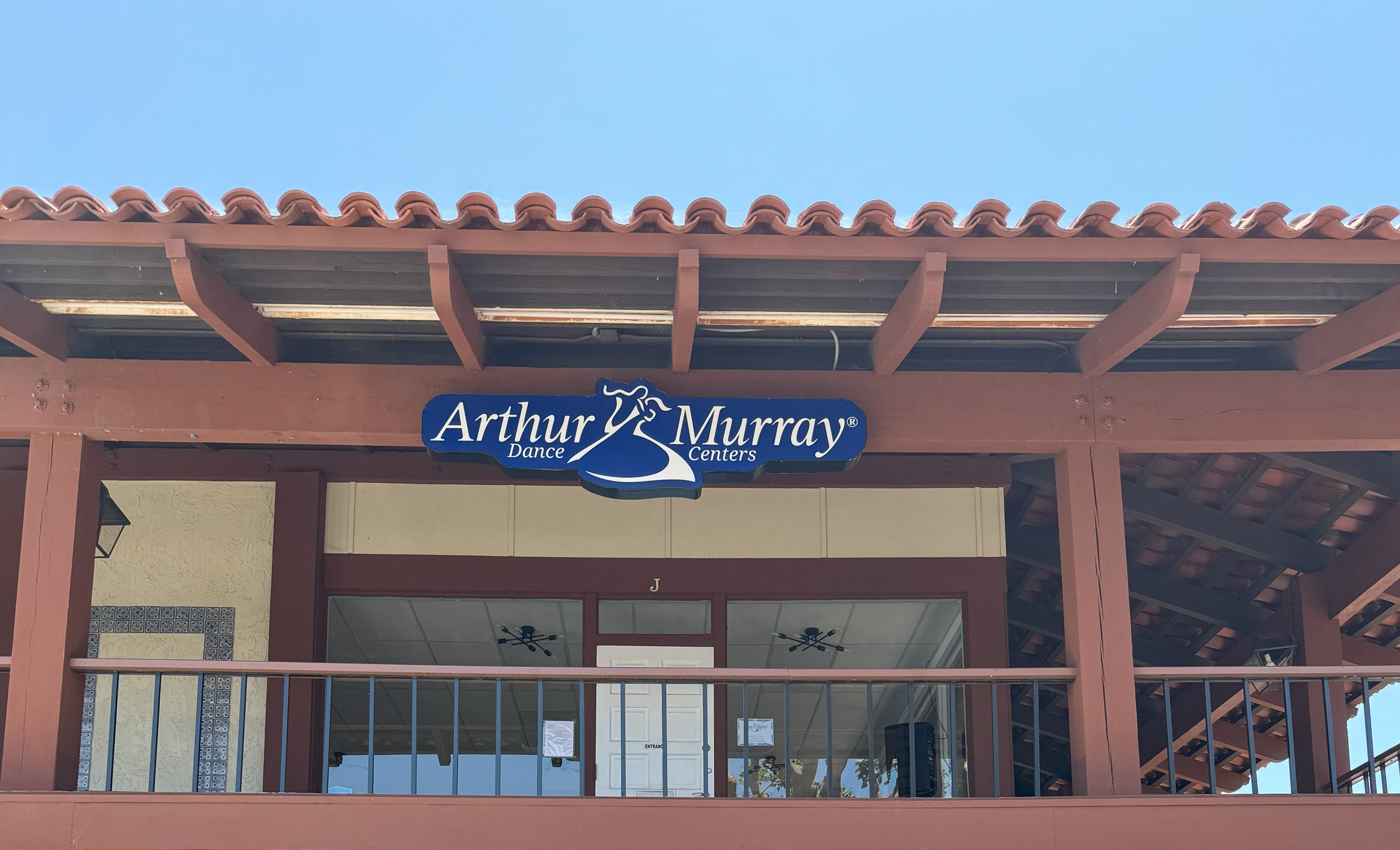 Lit mall storefront signage in Carlsbad