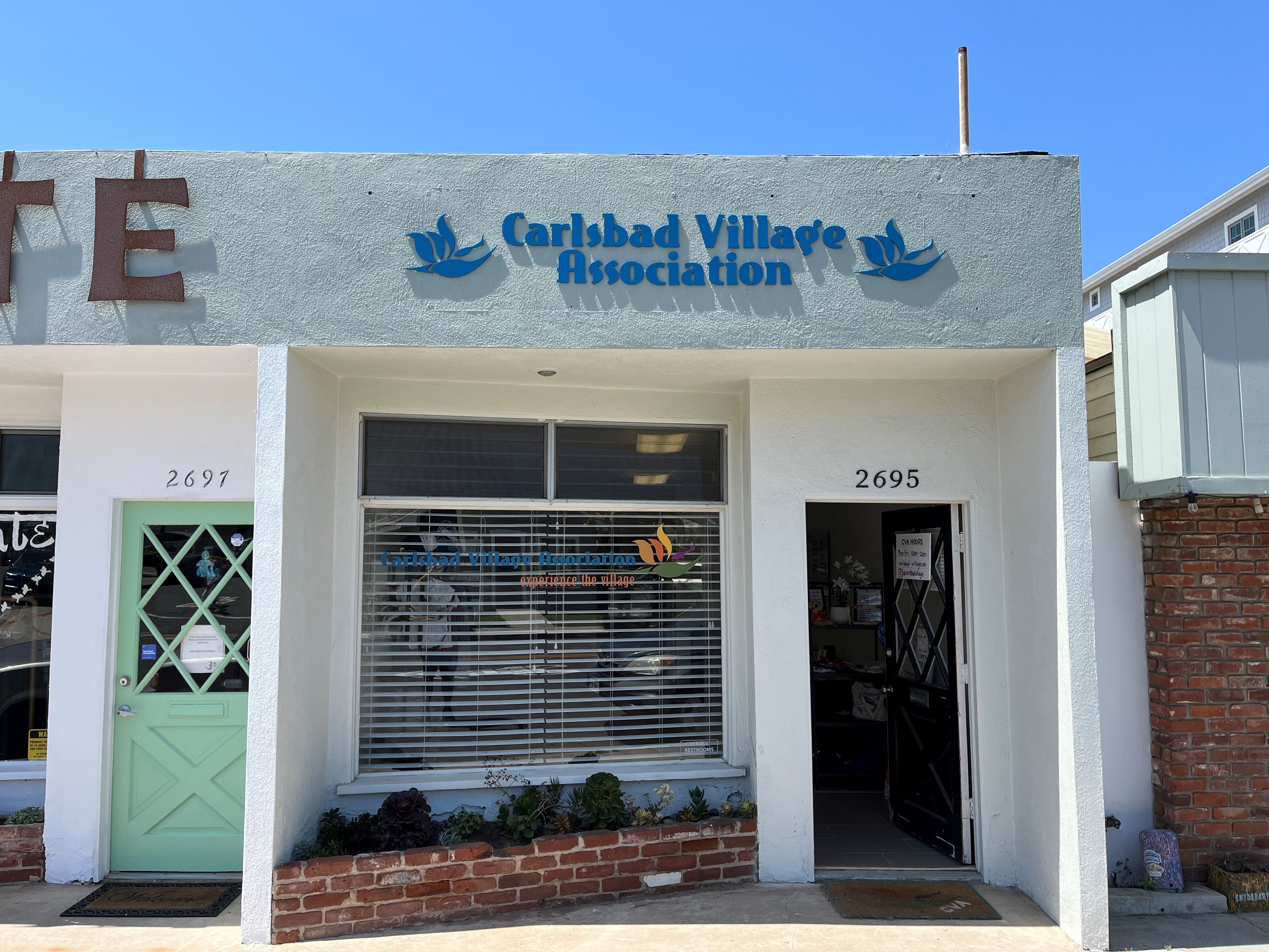 Storefront signage in the heart of the Carlsbad Village